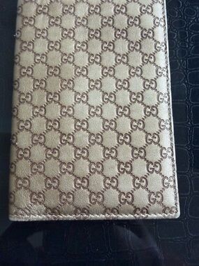 Gucci Metallic Gold Embossed Leather Wallet